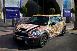 A car covered in macarons